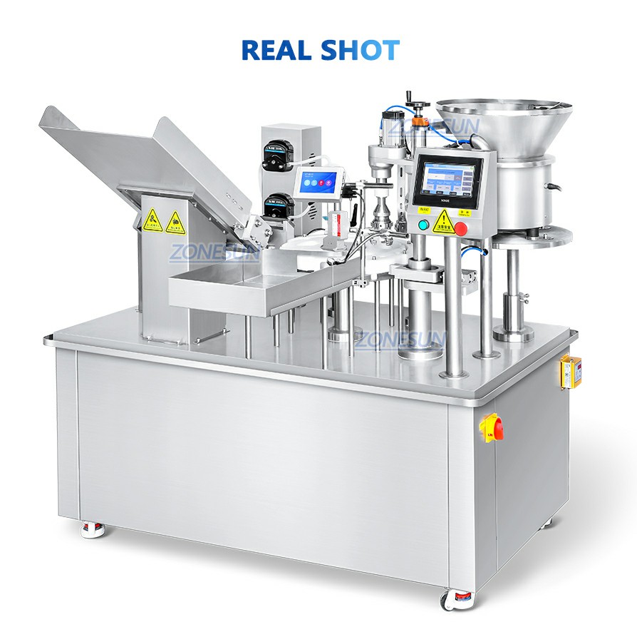 Imagen real de la máquina llenadora y tapadora de ampollas para bebidas